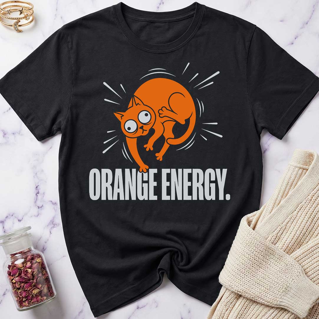 Black t-shirt with orange cat graphic and 'Orange Energy' text on a marble surface.