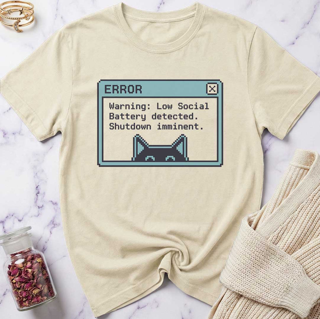Beige t-shirt with a graphic design on a marble surface