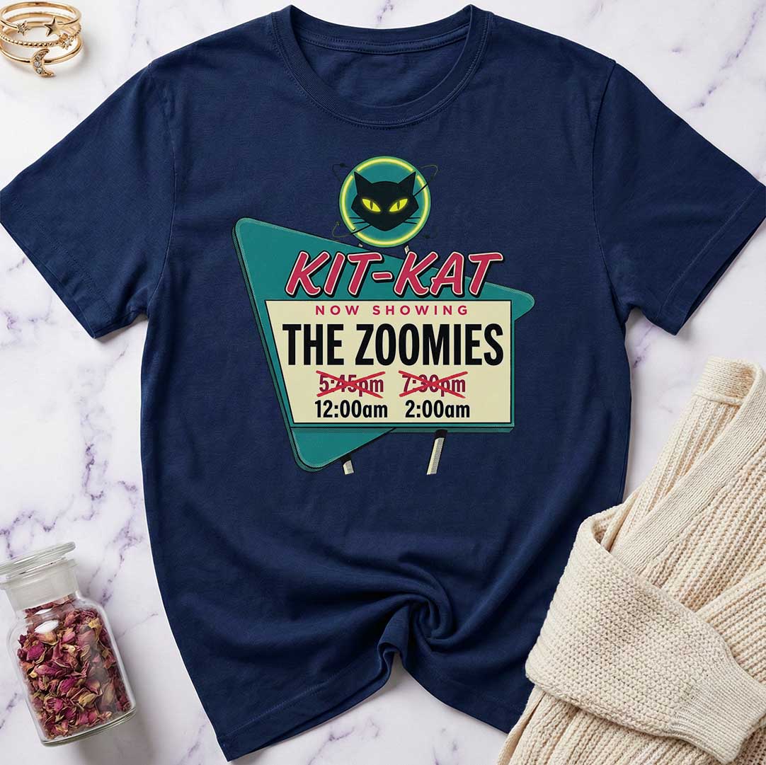 Navy blue t-shirt with a movie theater sign graphic on a marble surface.