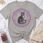 Gray t-shirt with a cat graphic and 'Certified Cat Mom Lifetime Member' text on a marble surface.