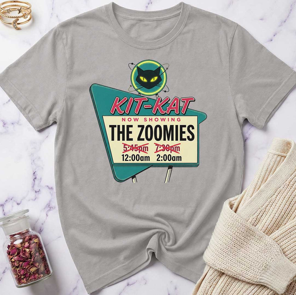 Gray t-shirt with a colorful graphic design on a marble surface