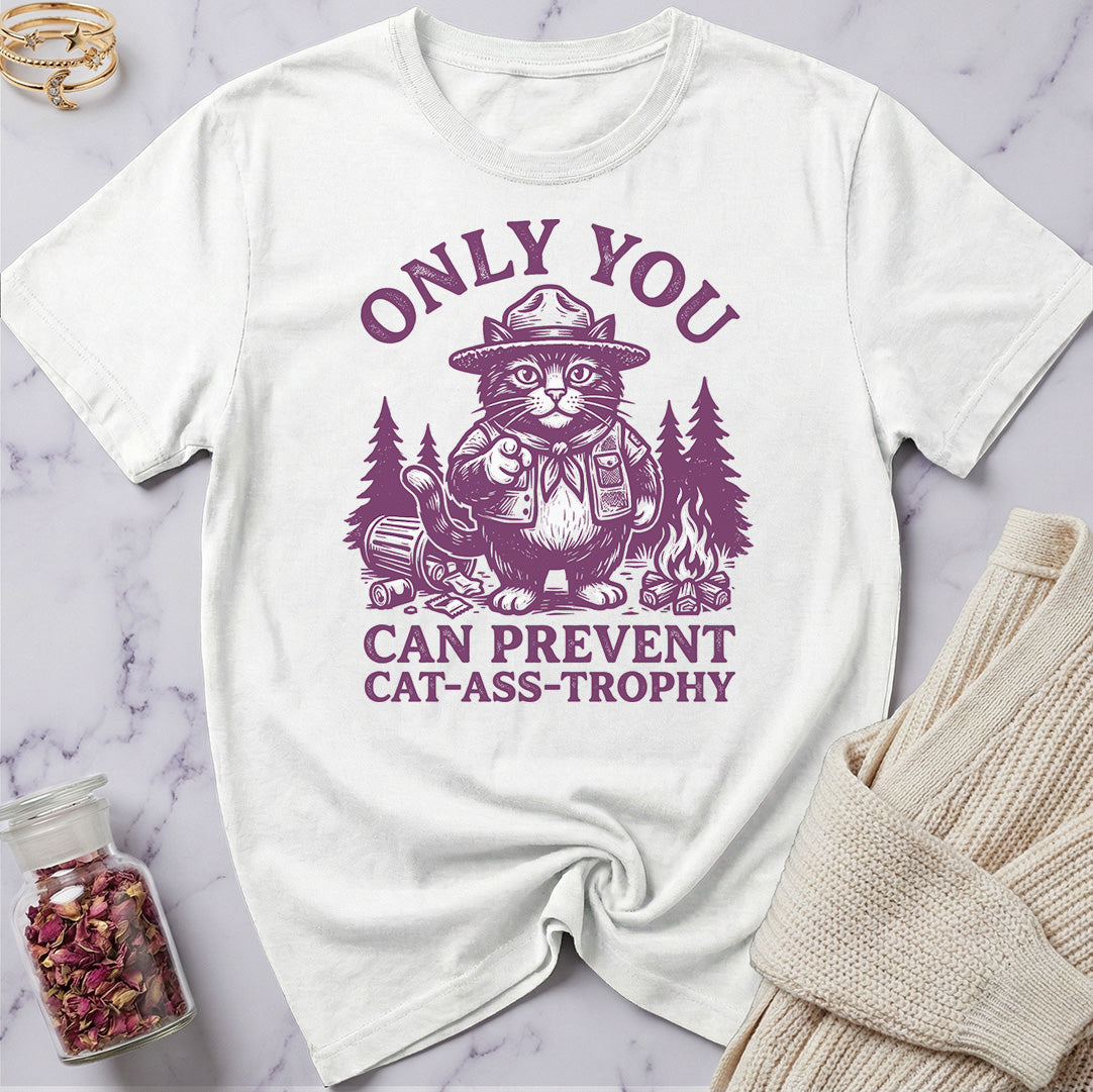White t-shirt with purple graphic and text on a marble surface