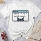 White t-shirt with a graphic design on a marble surface